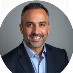 Professional headshot of Coach Jamal Al Mansouri